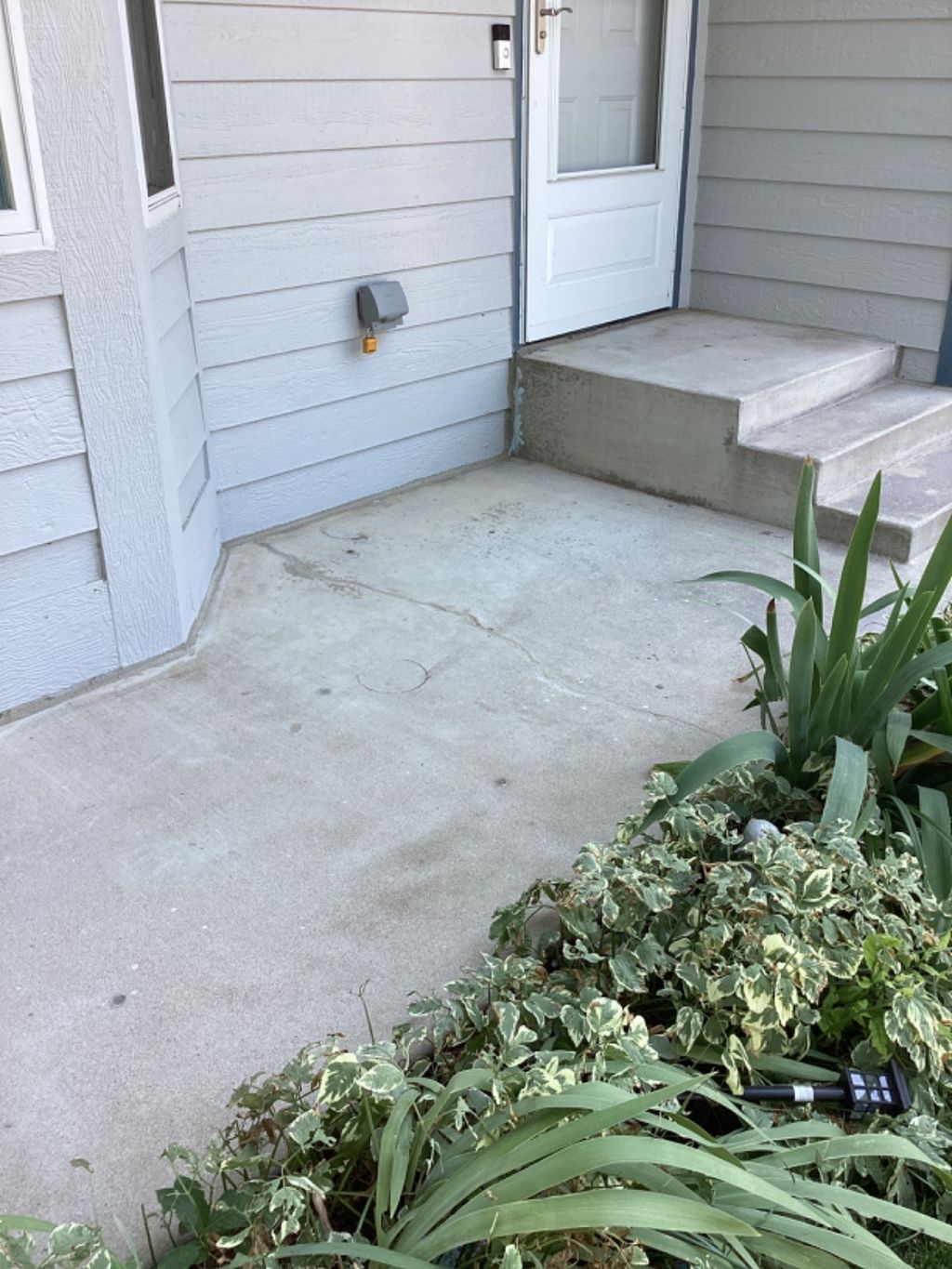 The patio and steps were raised back to the origin