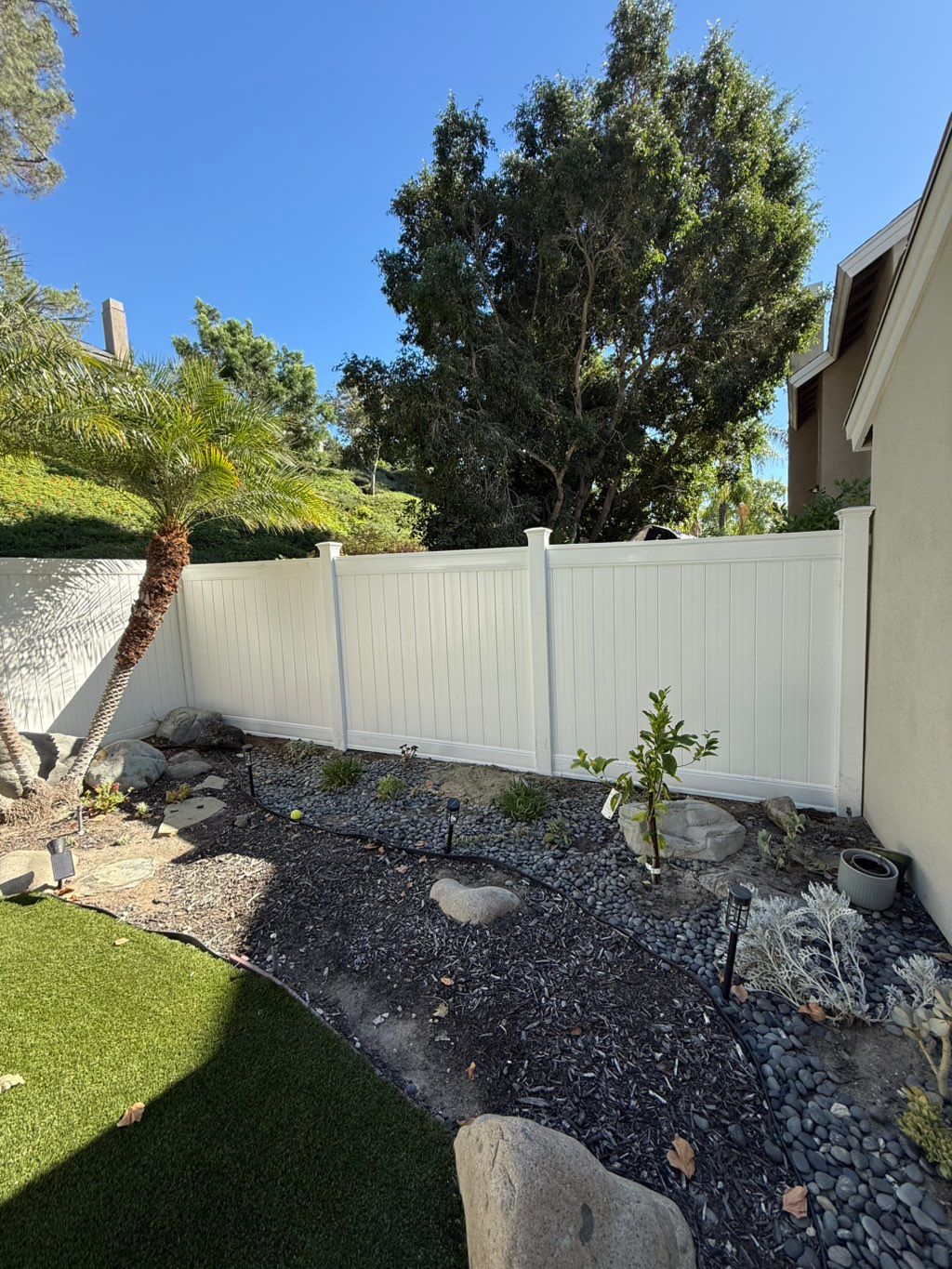 After installing a new vinyl fence