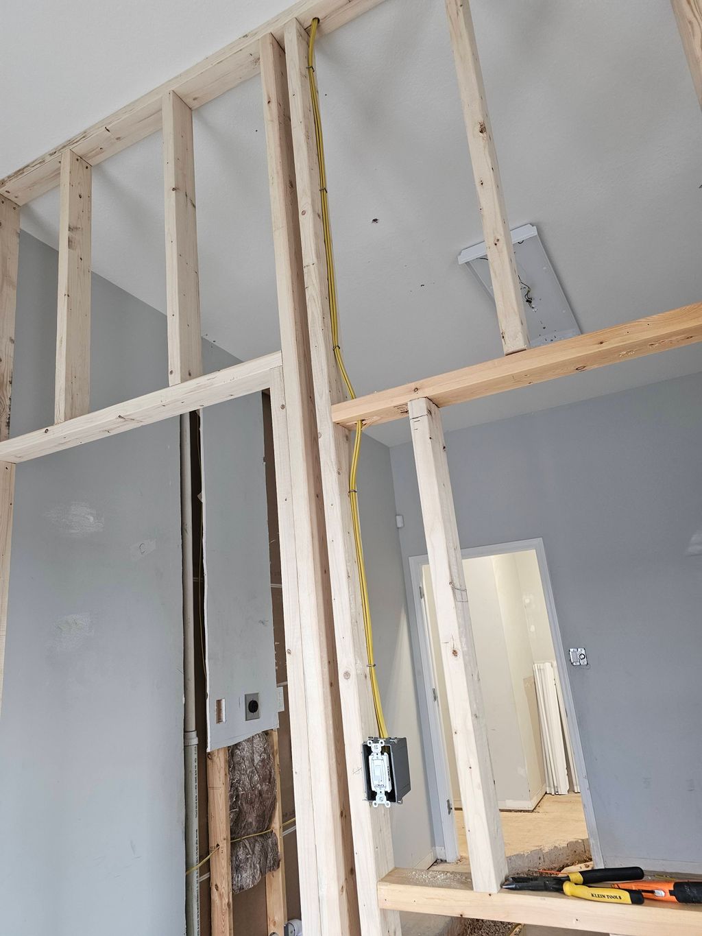 added light switch into new wall that was added to