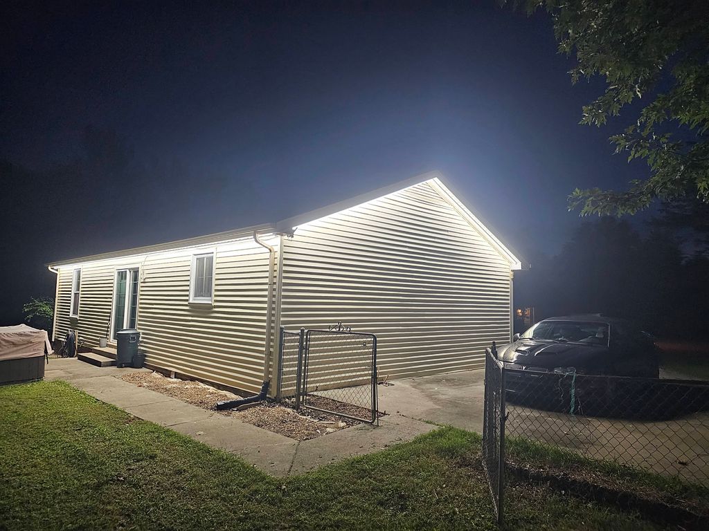 added outdoor lighting around this costumer house