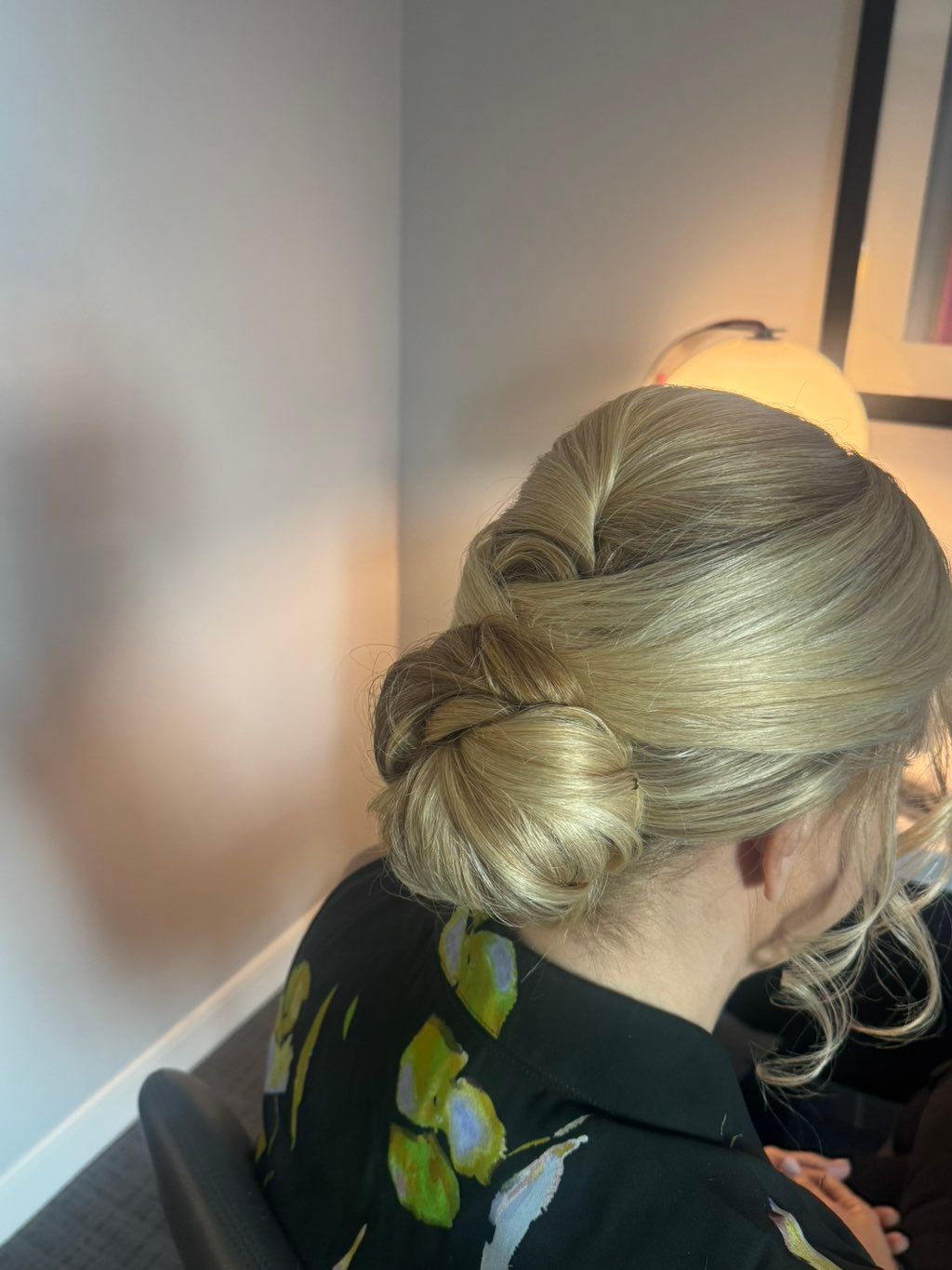 Neat twisty low bun w natural volume