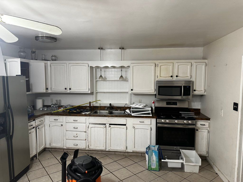 Before taking off the cabinets and floor tiles 