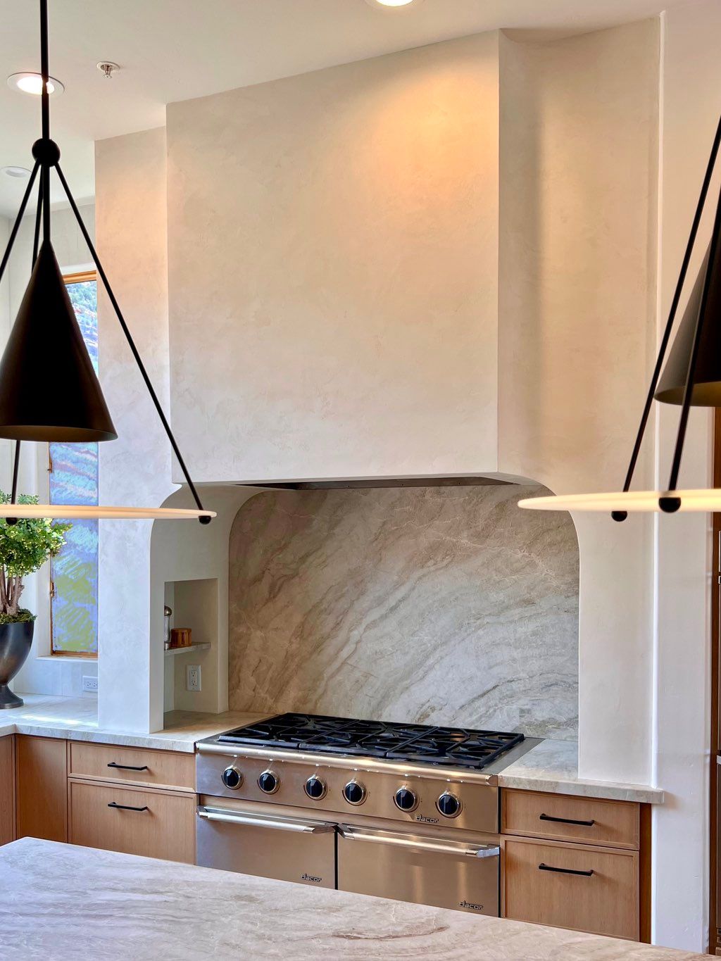 Italian plaster custom stove hood