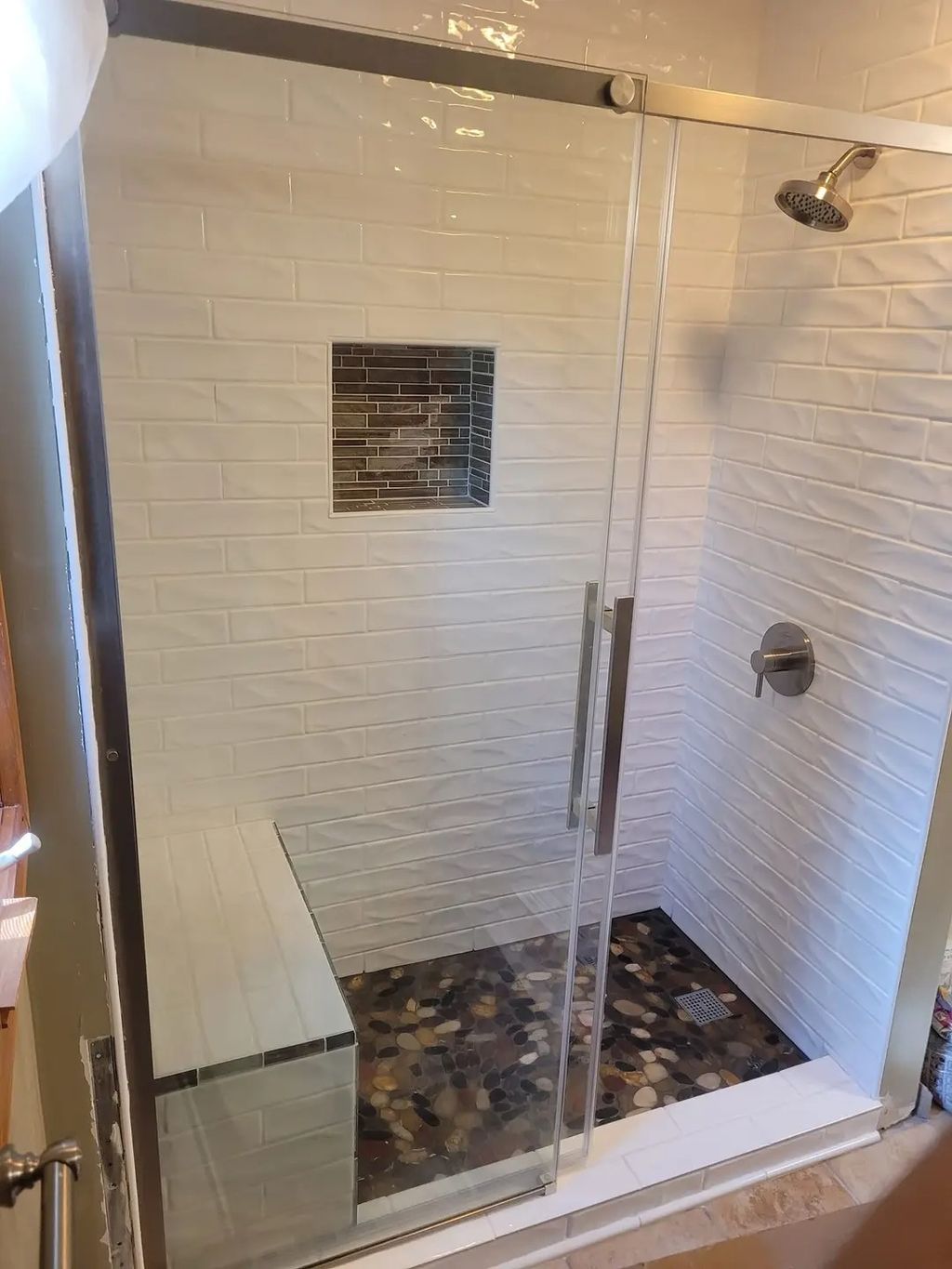 white ceramic subway tile installation. 