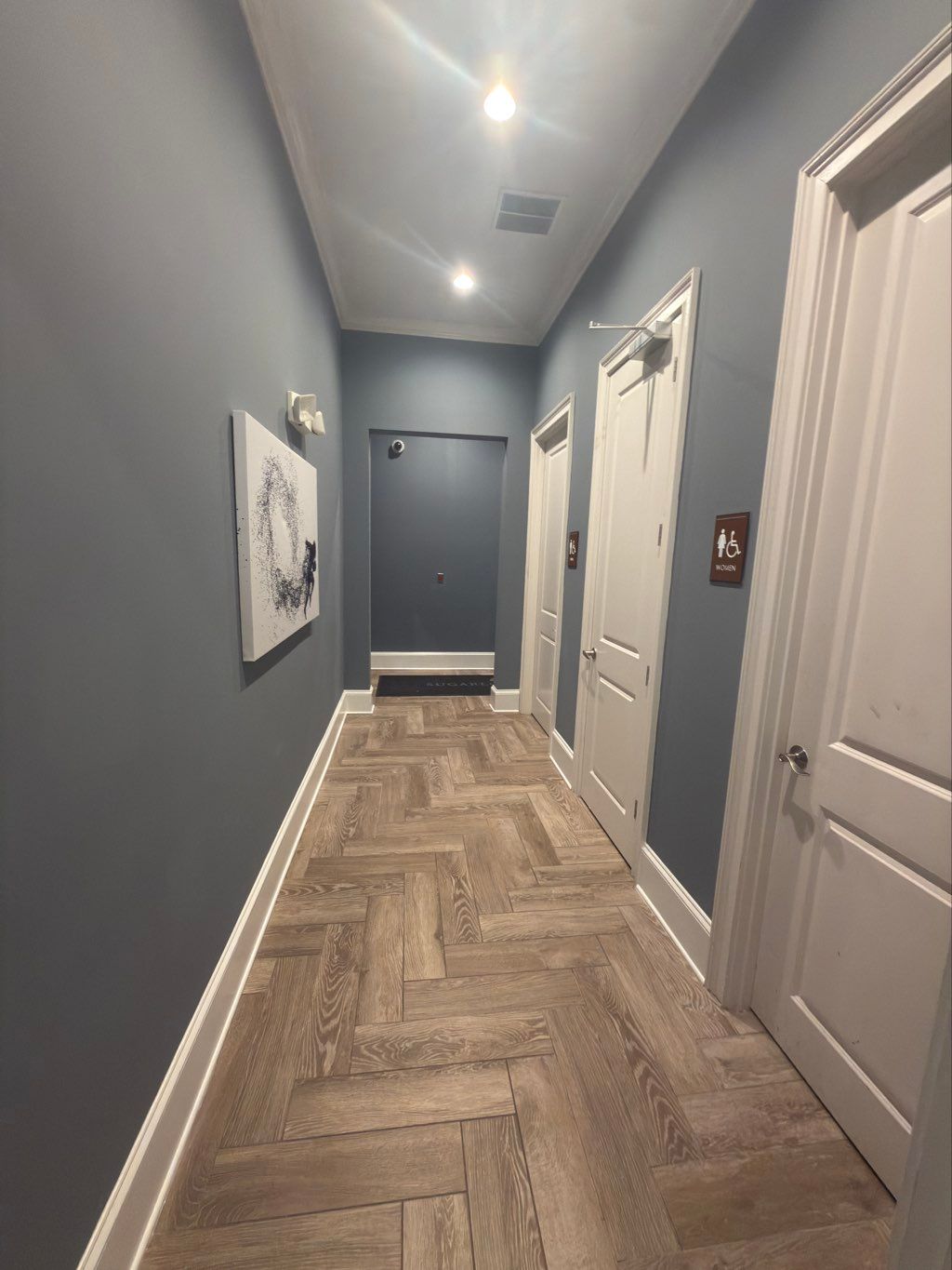 In this hallway, a color change was made from whit