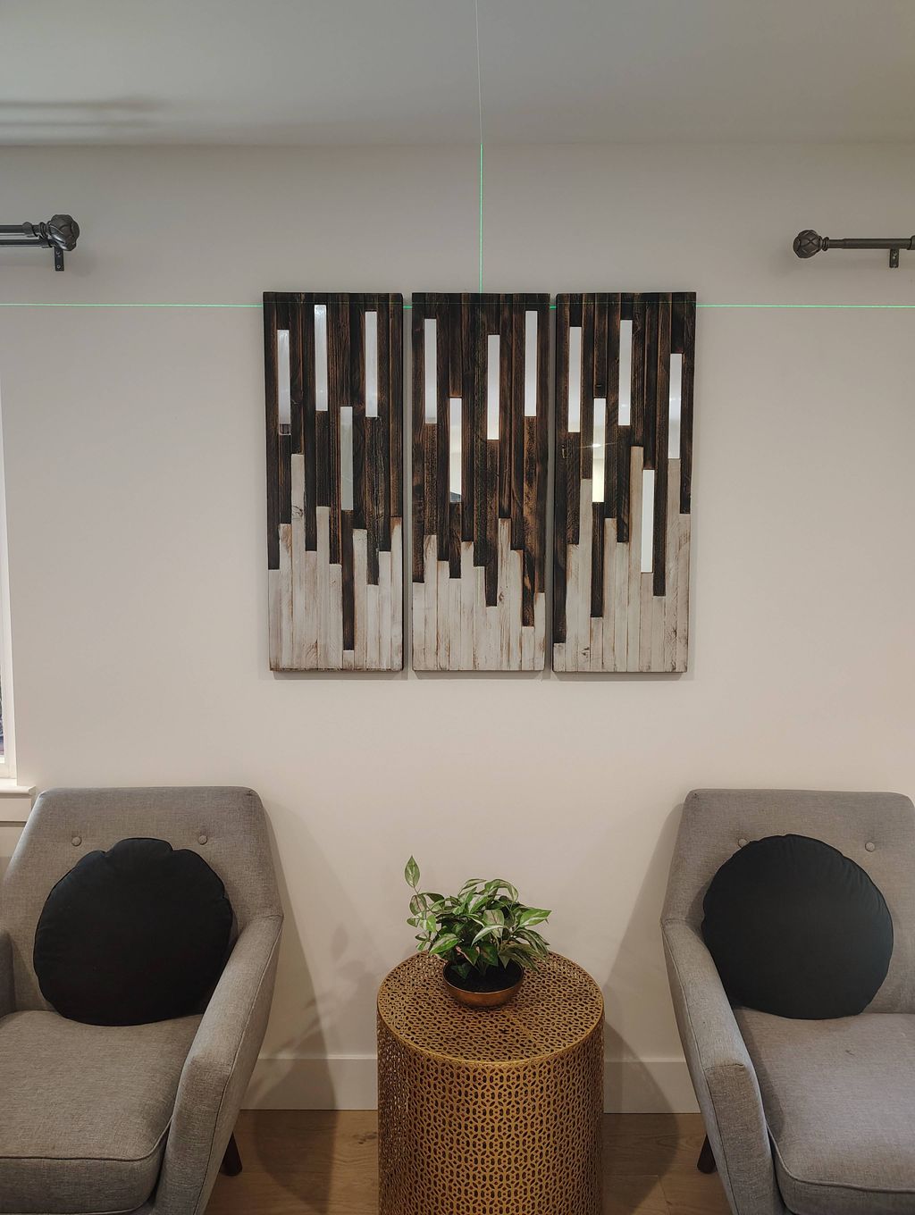 Hanging Art work using laser for perfect placement