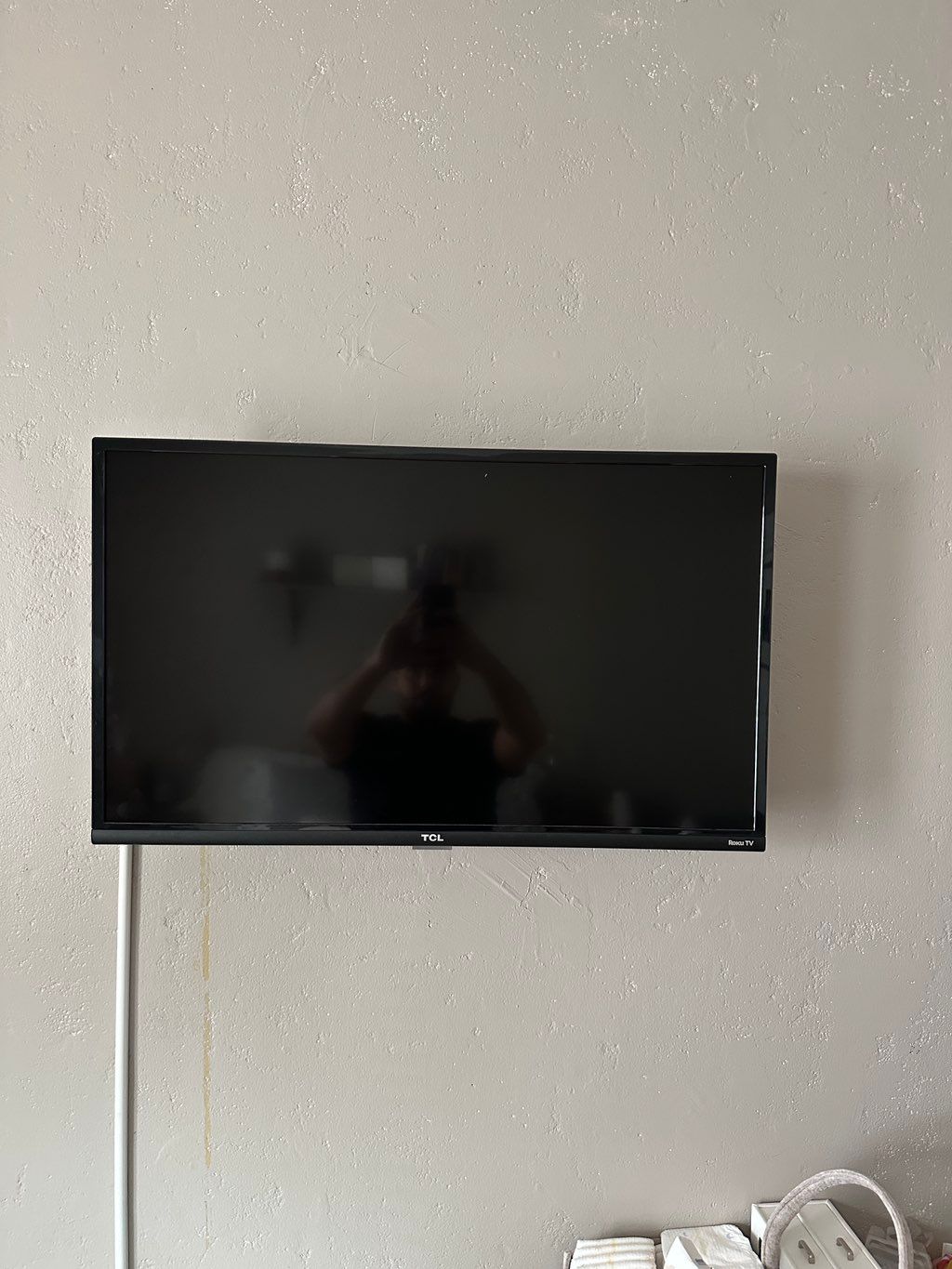 Handing tv and hiding wire.