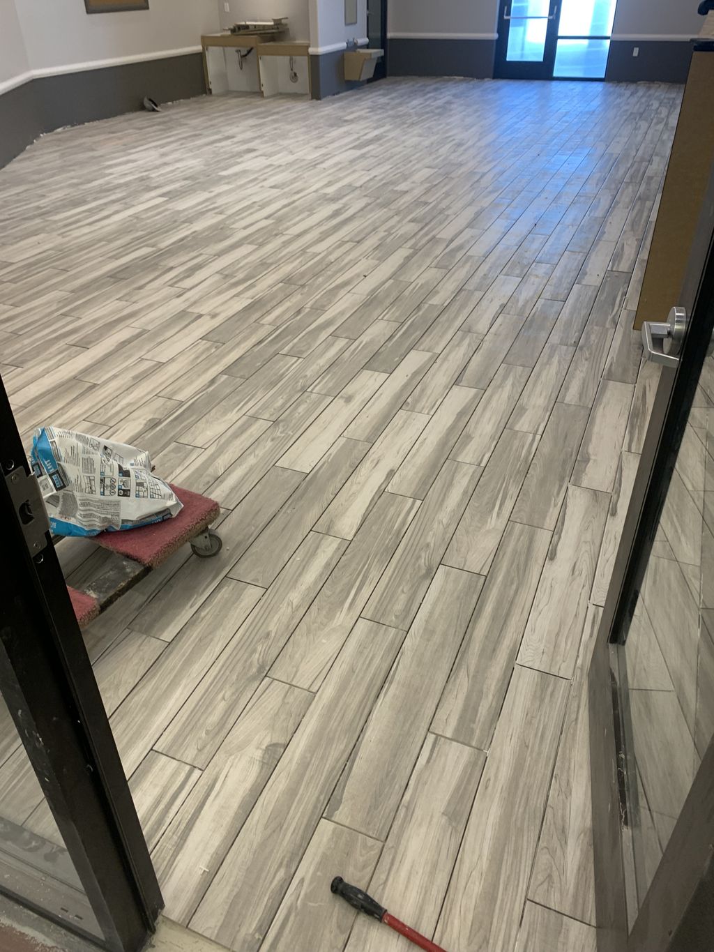 Tile installation at Children Learning Center. 