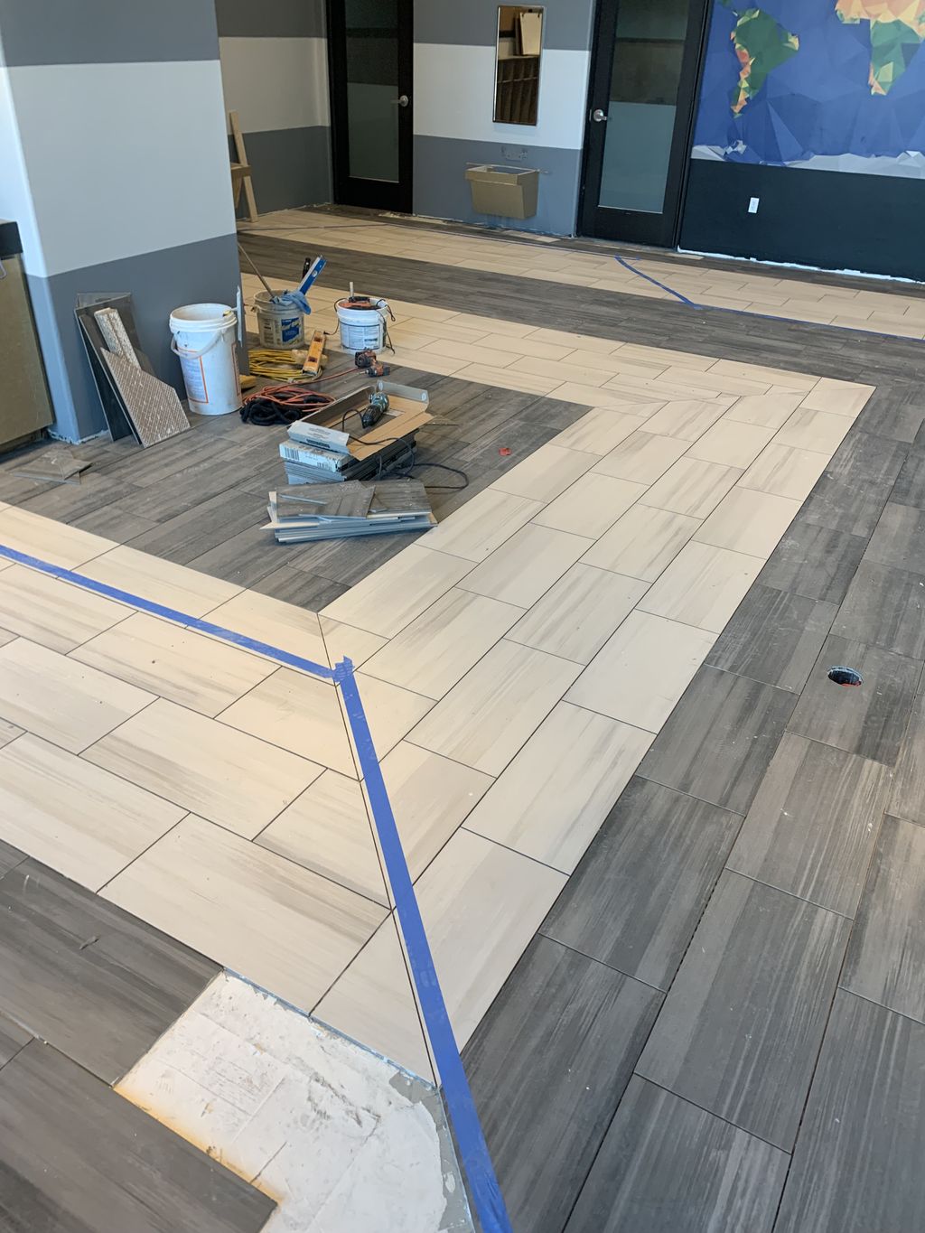 Tile installation with design at Children Learning