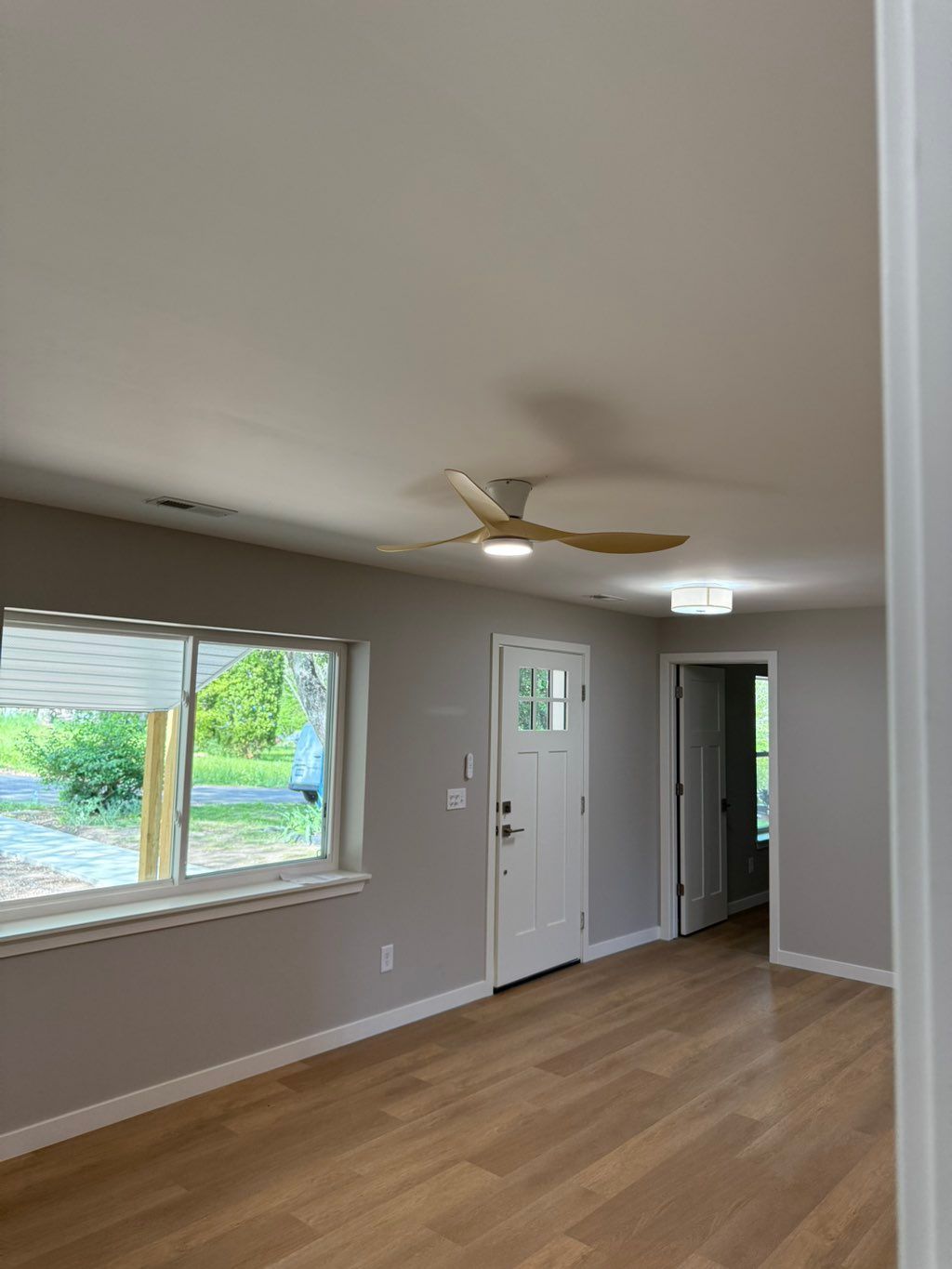 Smooth Walls, lvp flooring , new door and window i