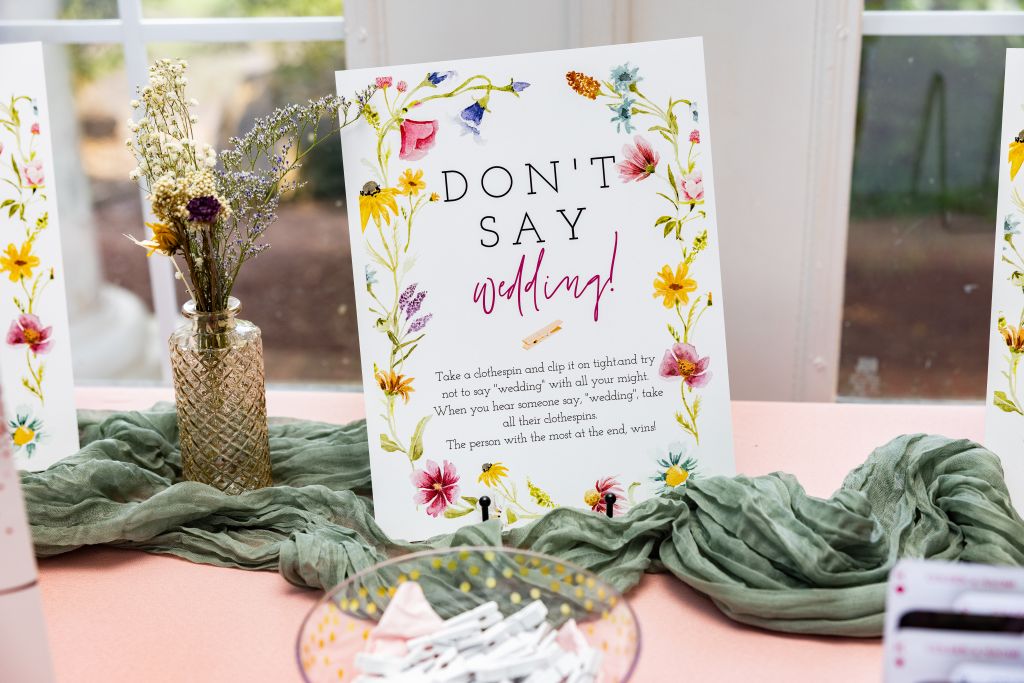 Set up for bridal shower clothing pin game, "Don't