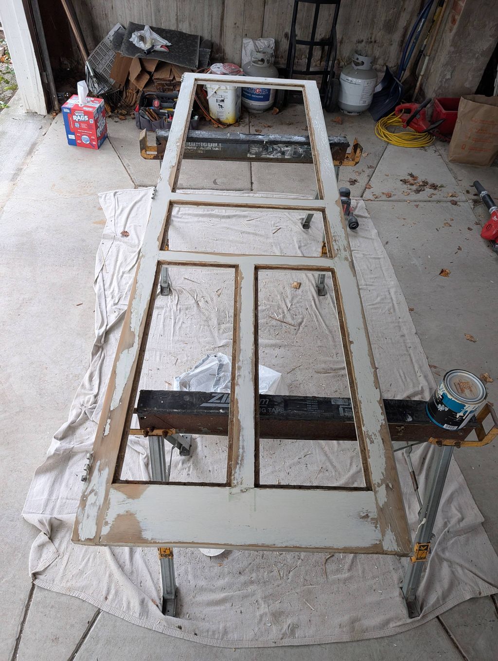 Restoration of wooden storm doors.