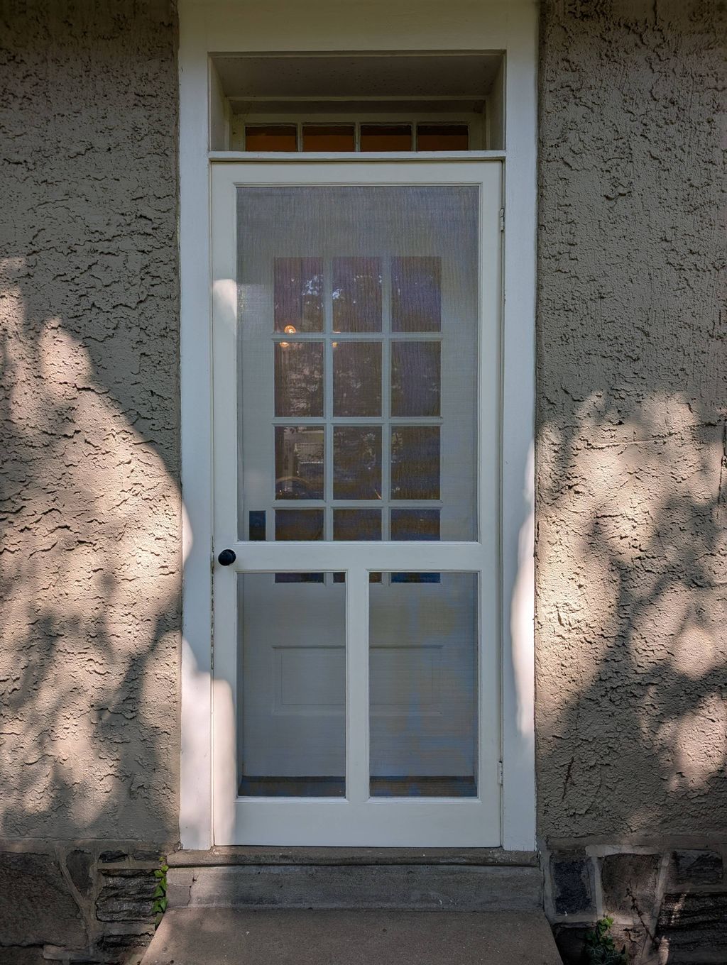 Restoration of wooden storm doors.