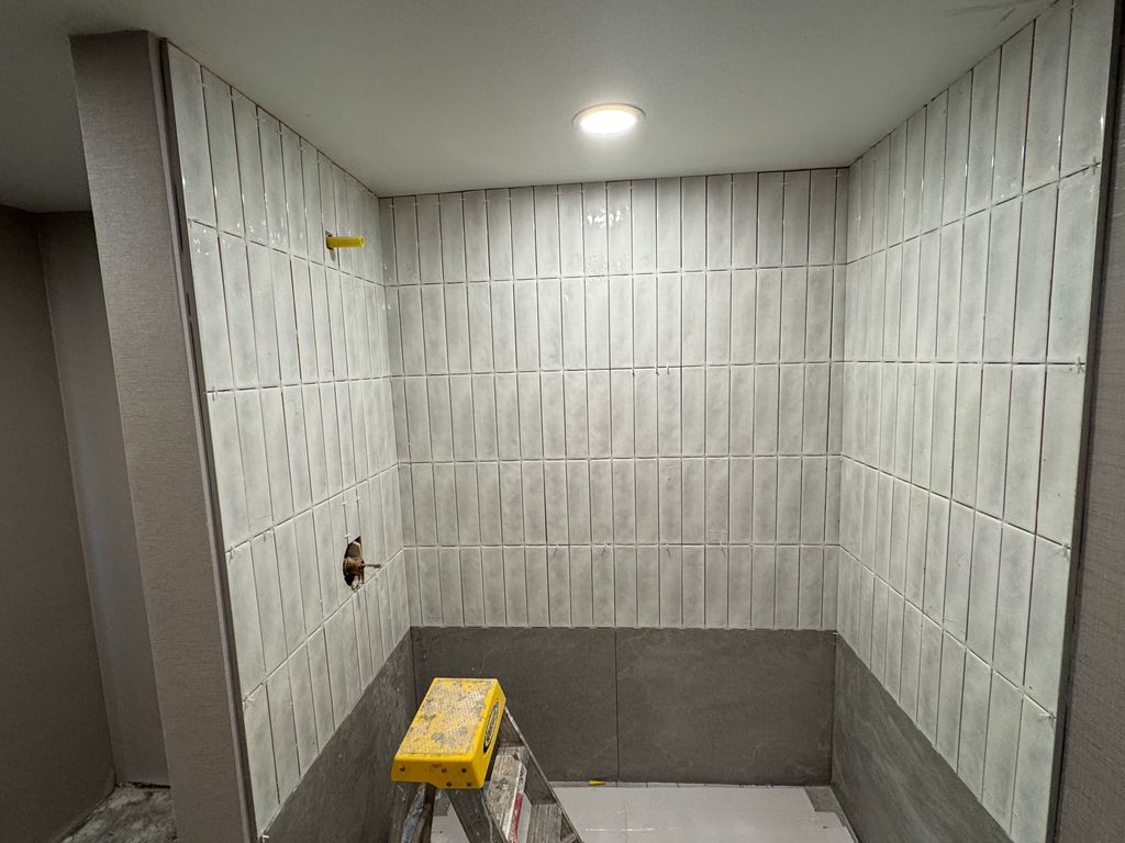 Example of tile work completed on bathroom