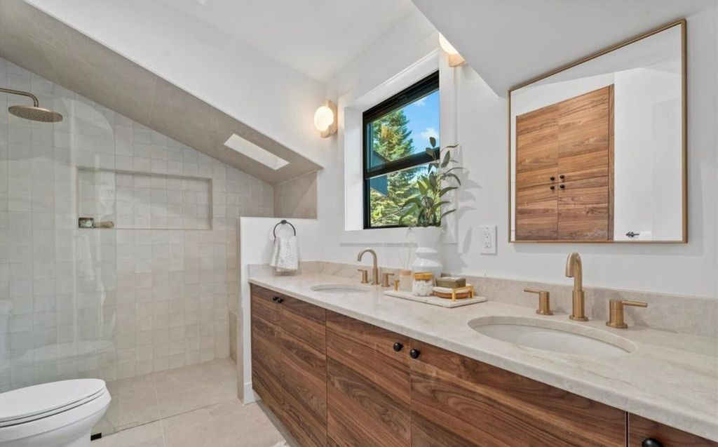 Modern bathroom design with warm wood tones and na