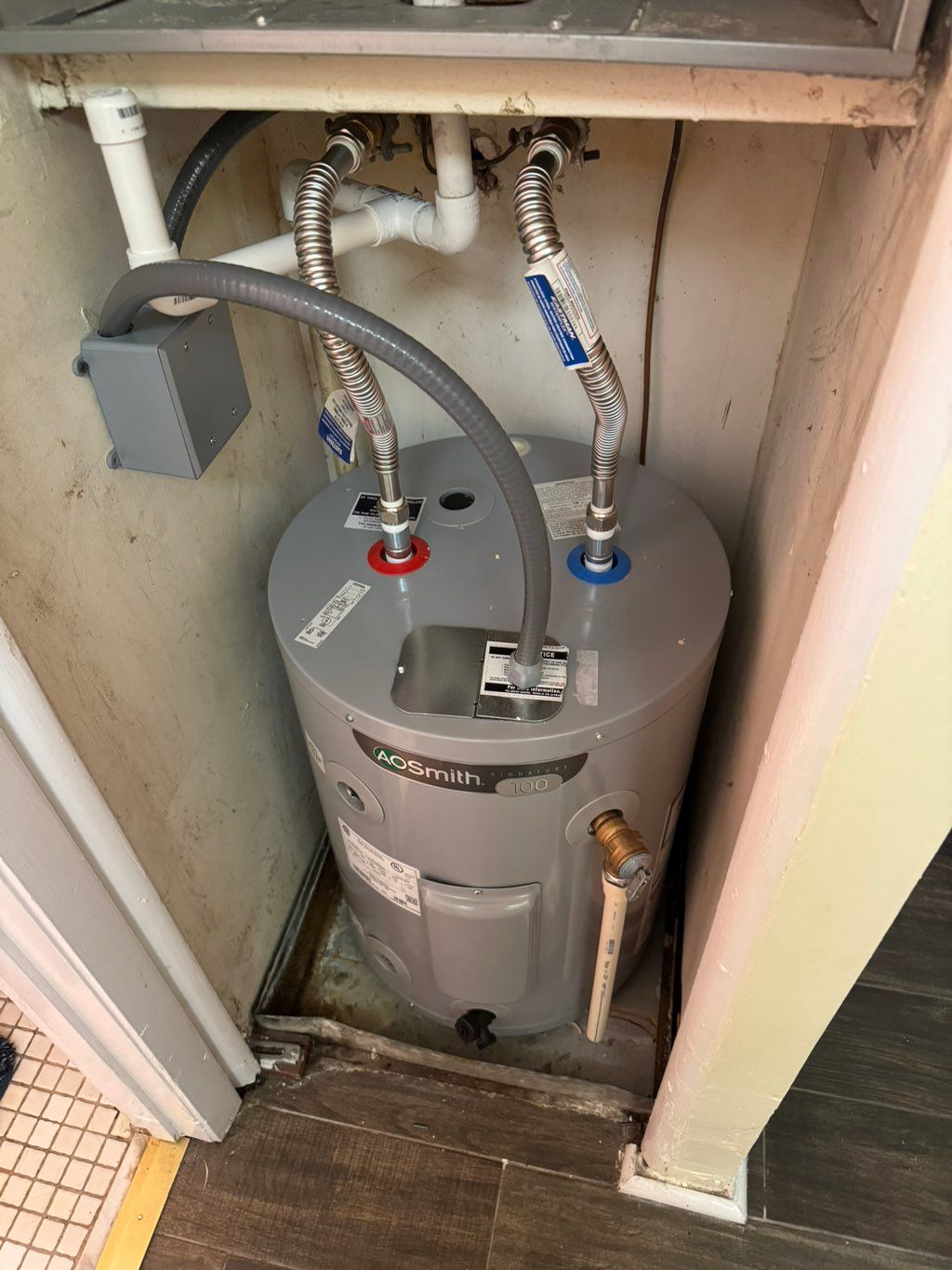 Replacement of old water heater with new electrica