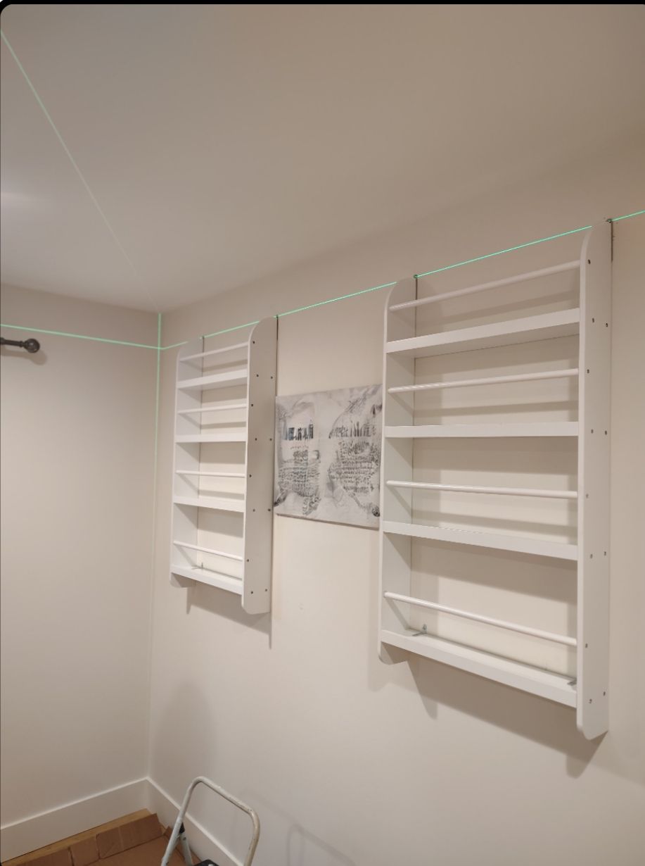 Assembled floating kids book shelves. Then mounted