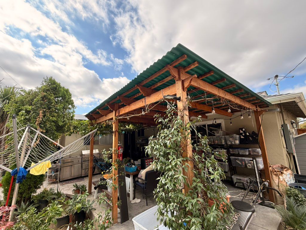 Pergola work fixing some leaks! 