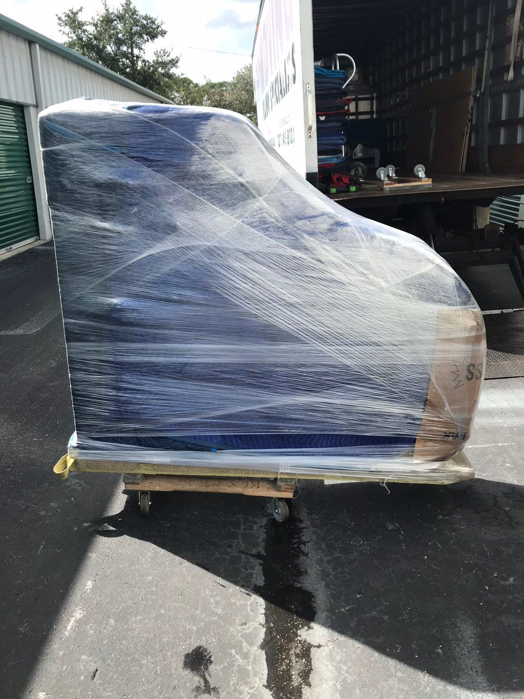 Baby grand wrapped and ready for shipping. This on