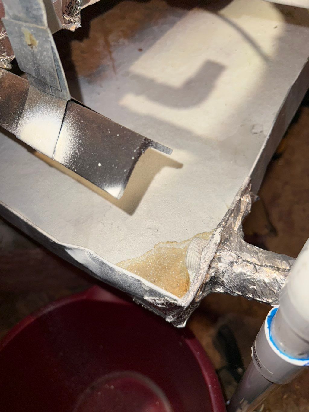 Another Company’s repair was using tape on a drain