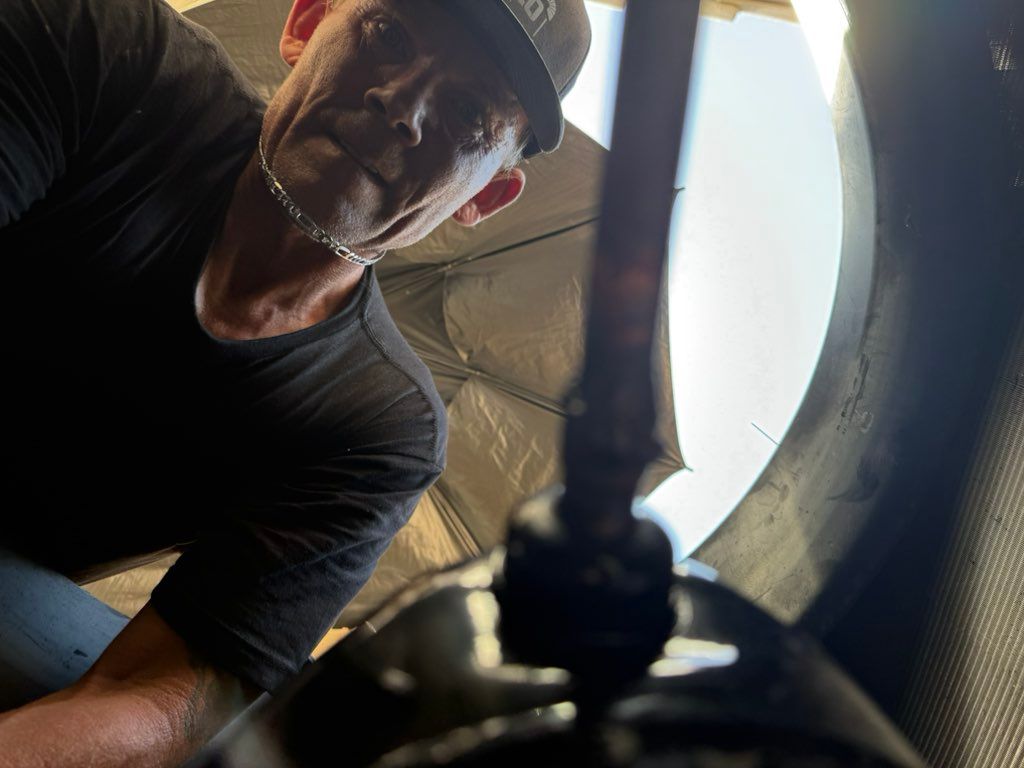 Checking for leaks on a repaired unit.