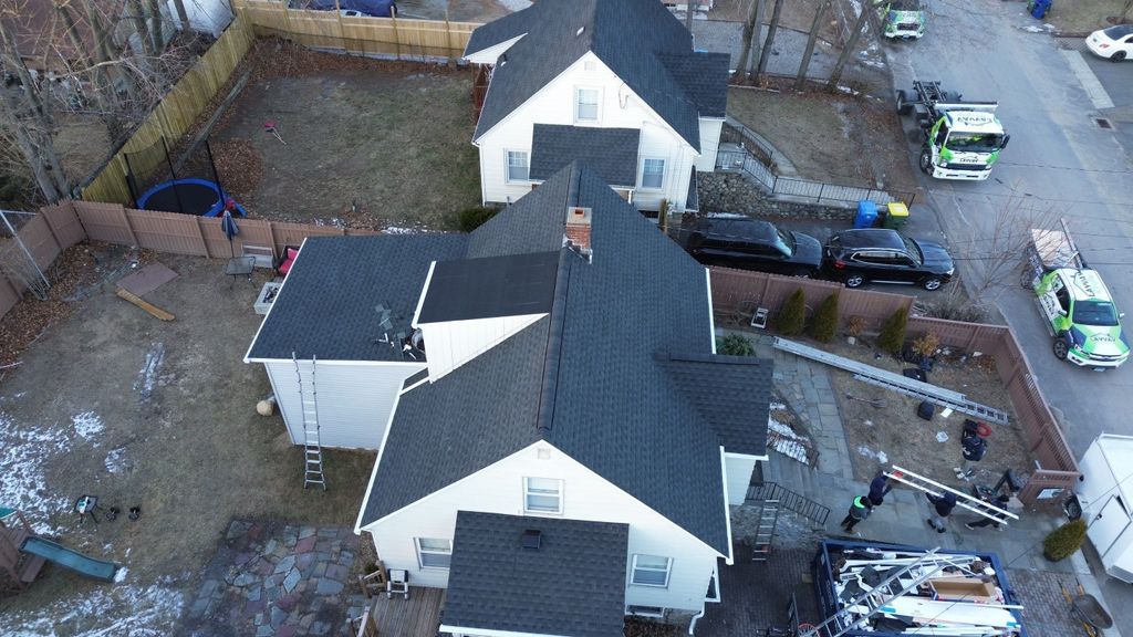 After: New asphalt shingle roof completed by Layva