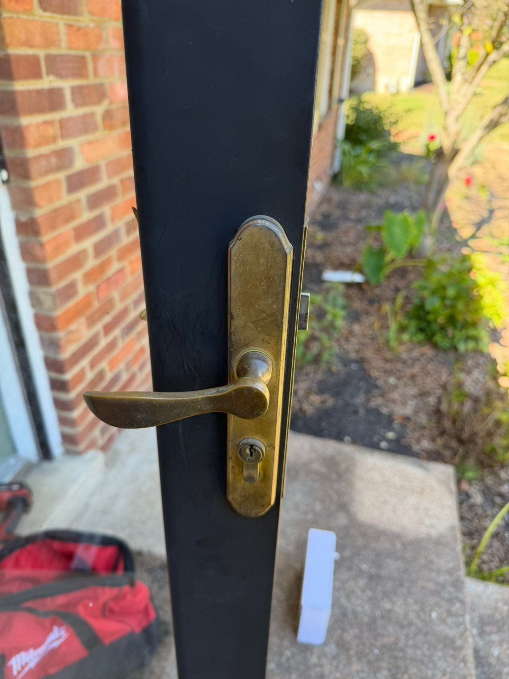 Old storm door lock