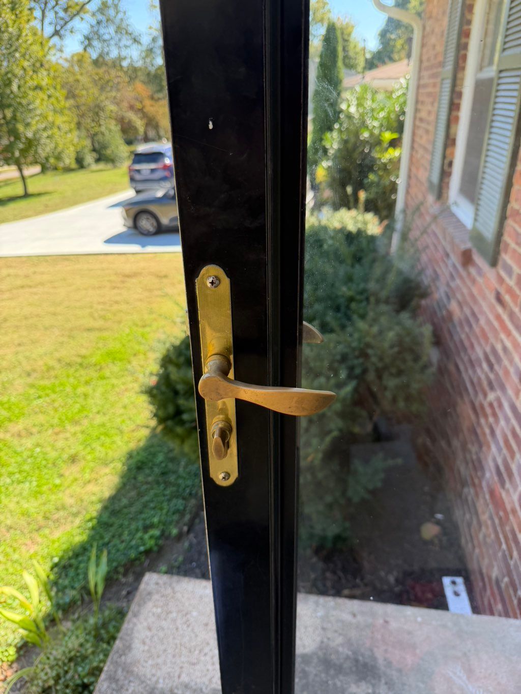 Old storm door lock