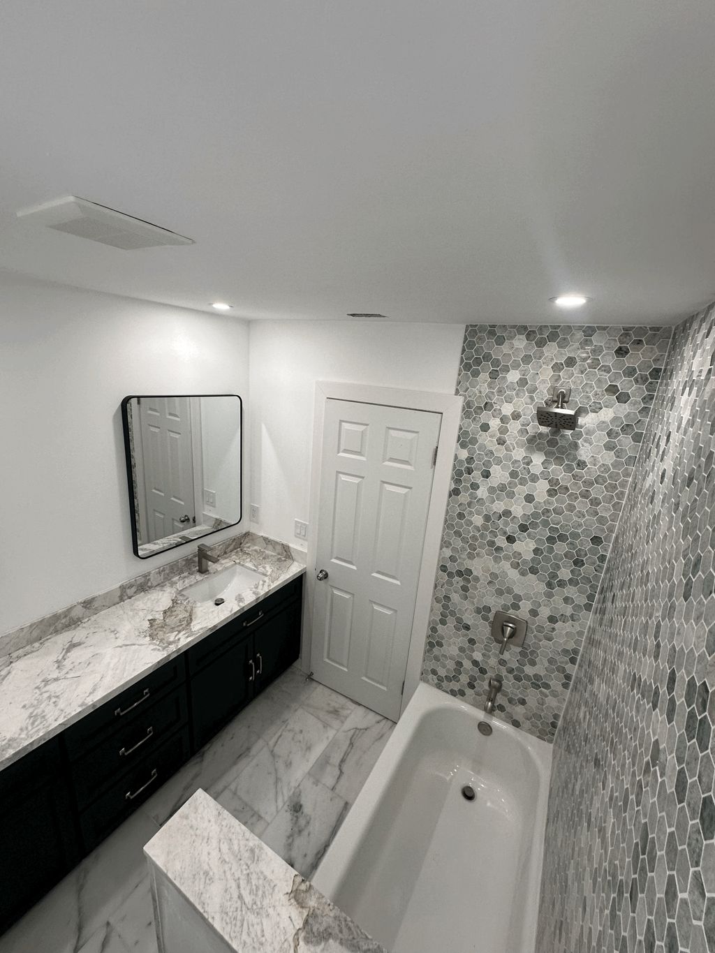 Bathroom Remodel | Custom tile + modern finishes