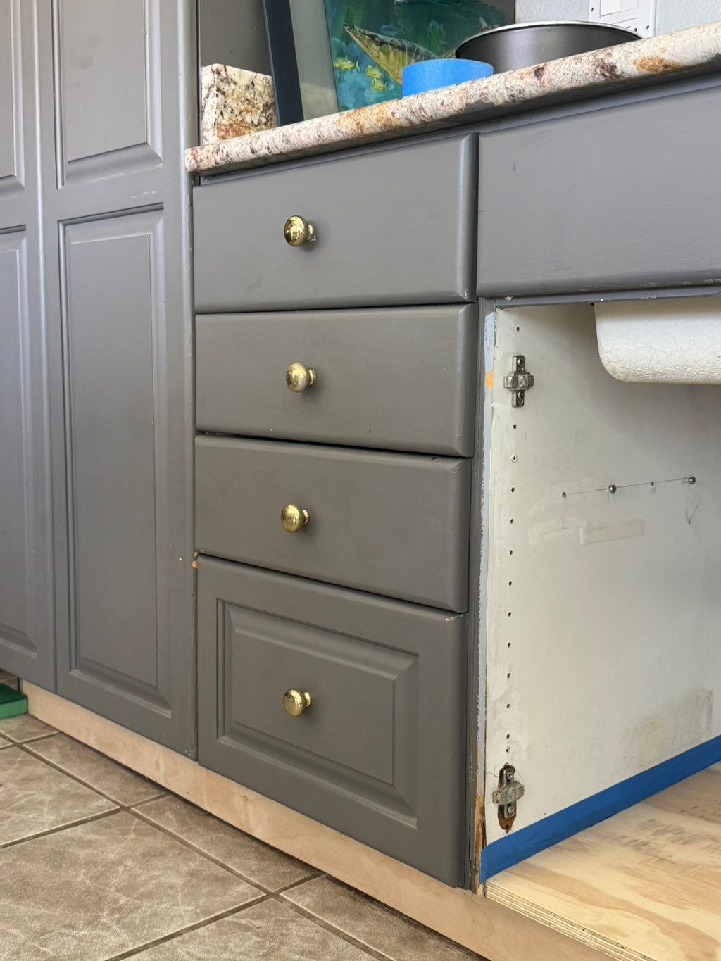 Rebuilt rotted toe kick and bottom shelf