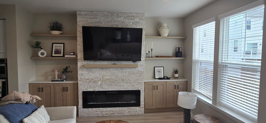 Added Fireplace, floating shelves, stonework and c