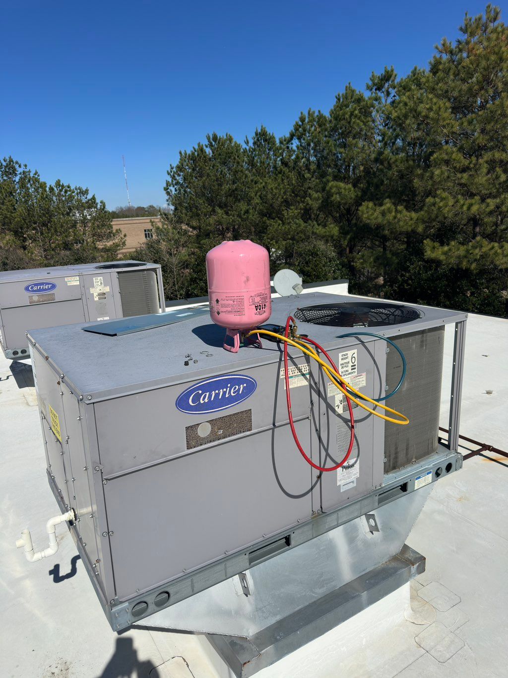 Commercial repair and service to a rooftop air con