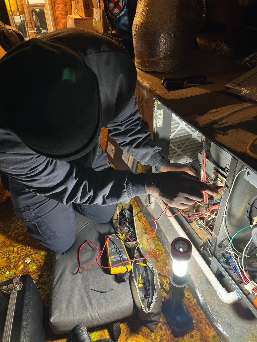 Troubleshooting and repairing a gas furnace for a 