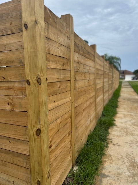 Horizontal Board Fence.  Modern sleek appearance, 