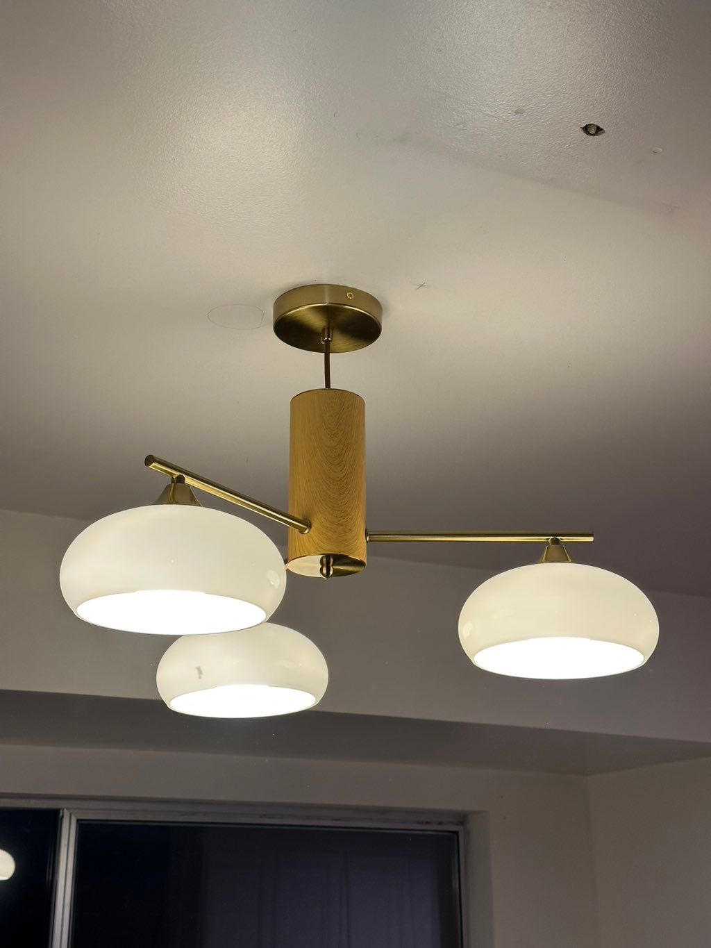Dining area pendant light installed at a completel