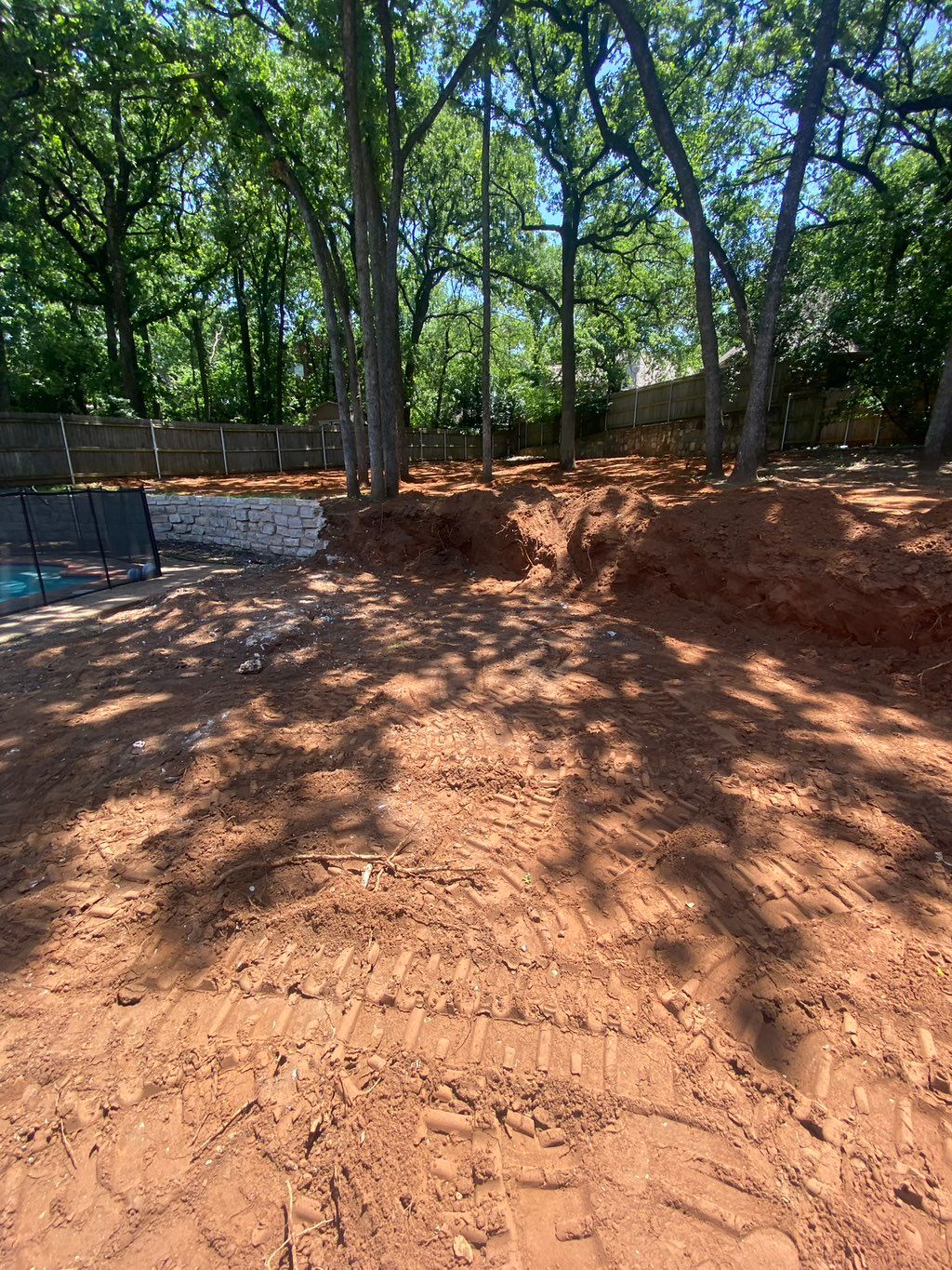 Pushed back retaining wall 