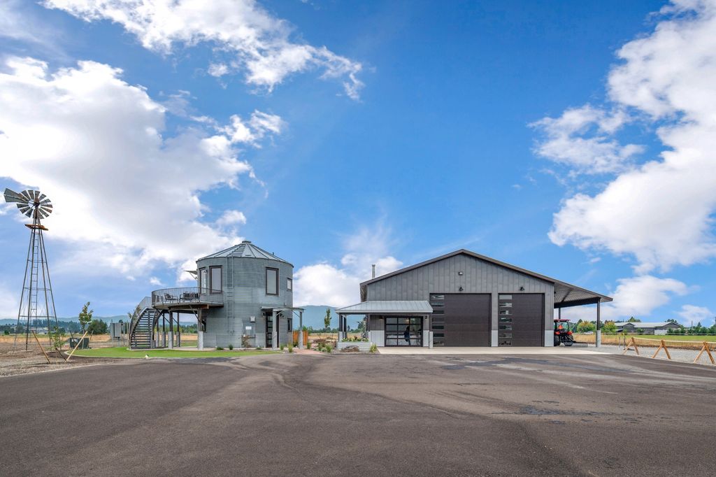 Silo Converted to a home with large garage 