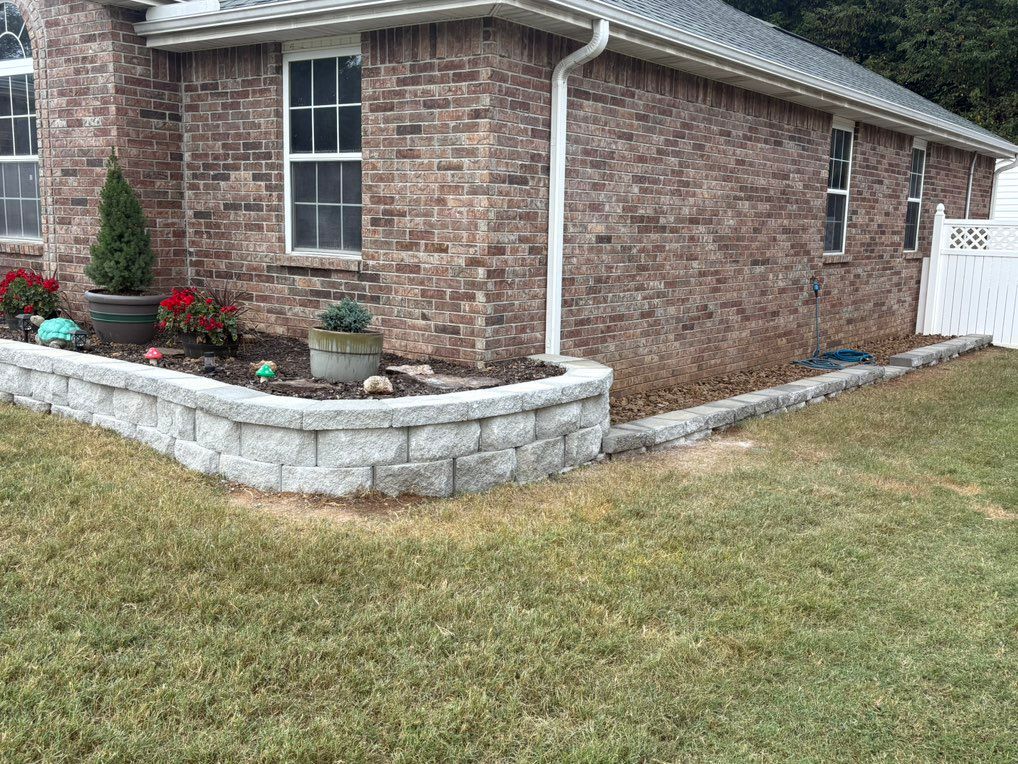 Block wall replacement on this front landscape 