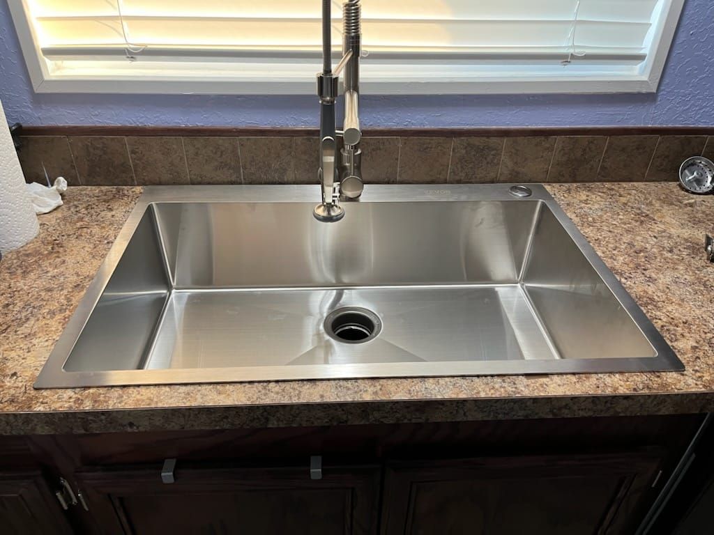 Upgraded sink, faucet, and garbage disposal instal