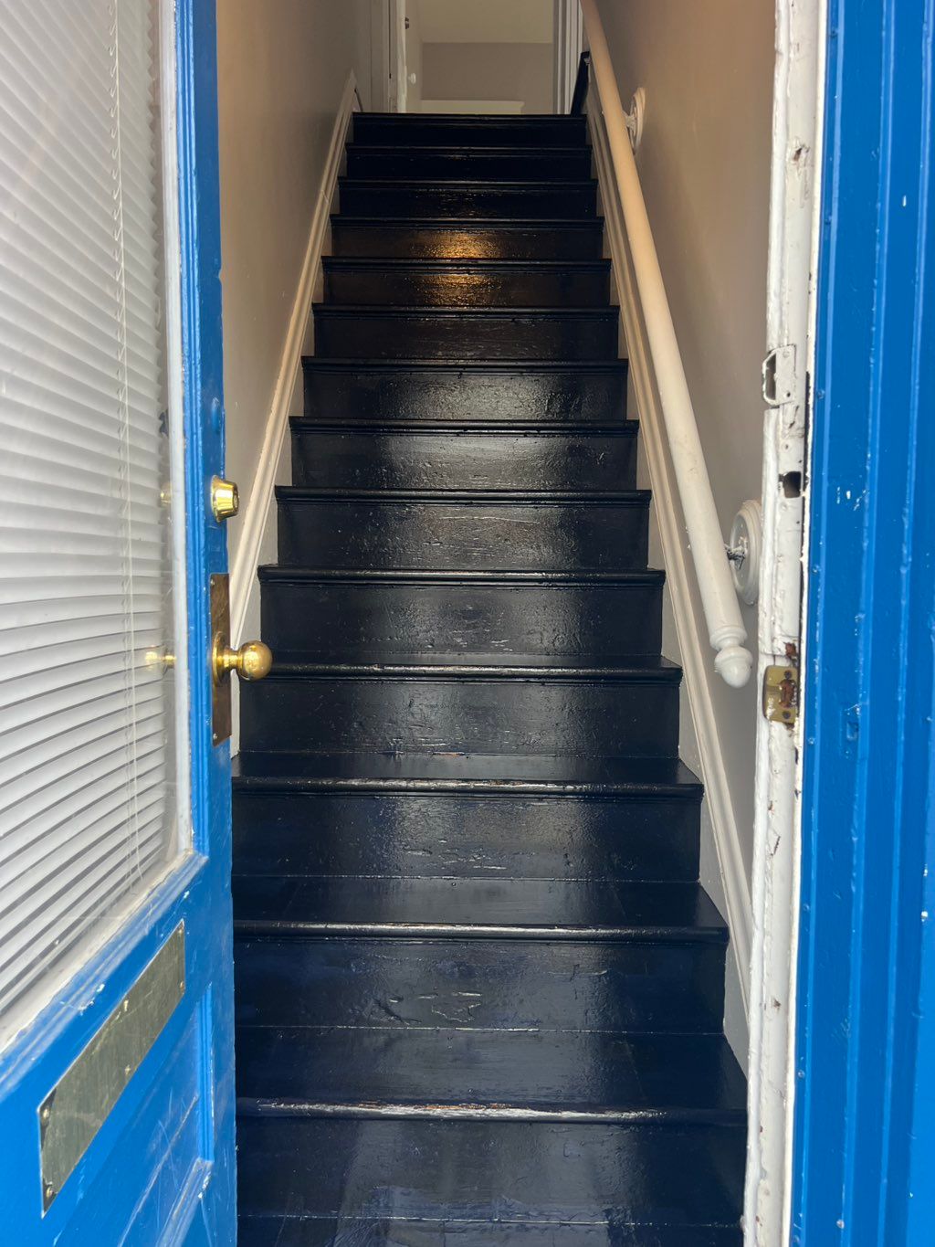 Old stairs painted black for customer 