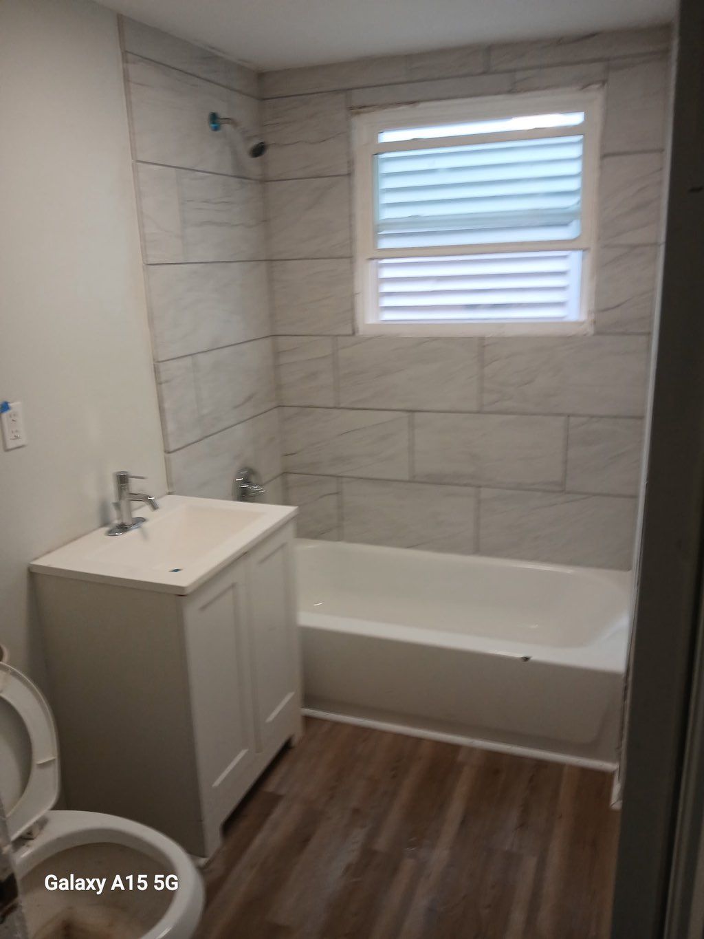 We demo and installed a tiling surround.