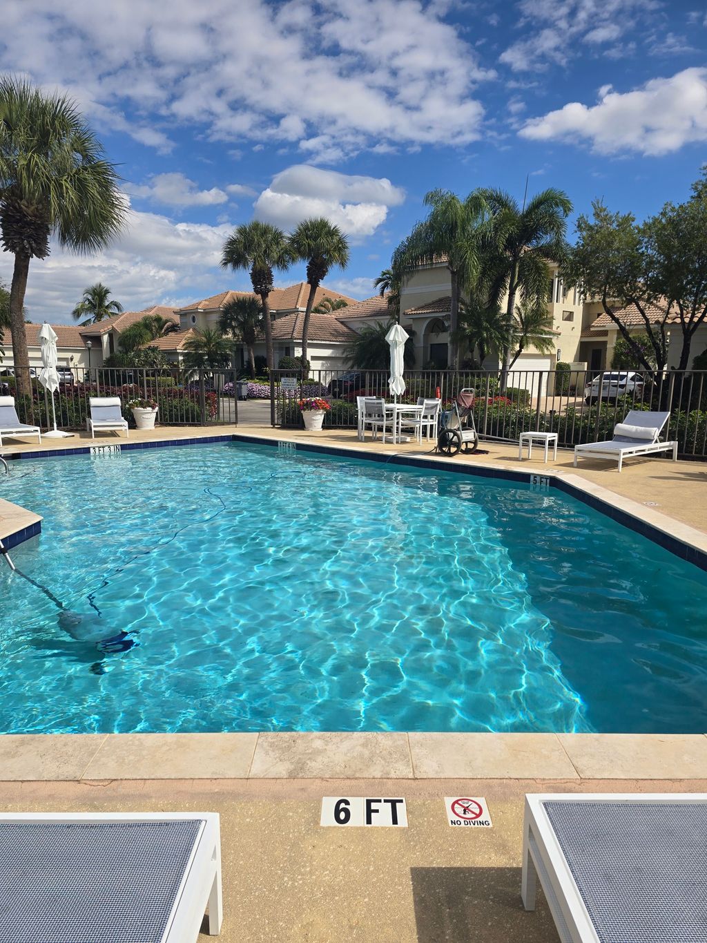 Refreshing PB Pool Doc Customer Pool Cleaning