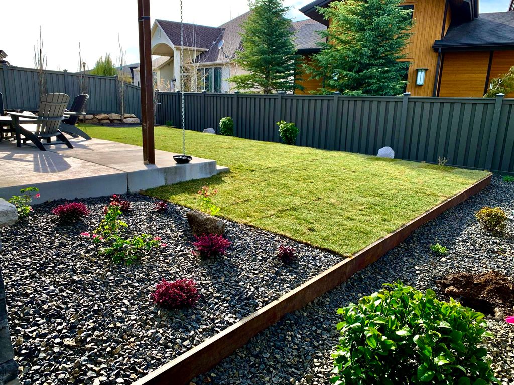 Custom steel edging and raised lawn