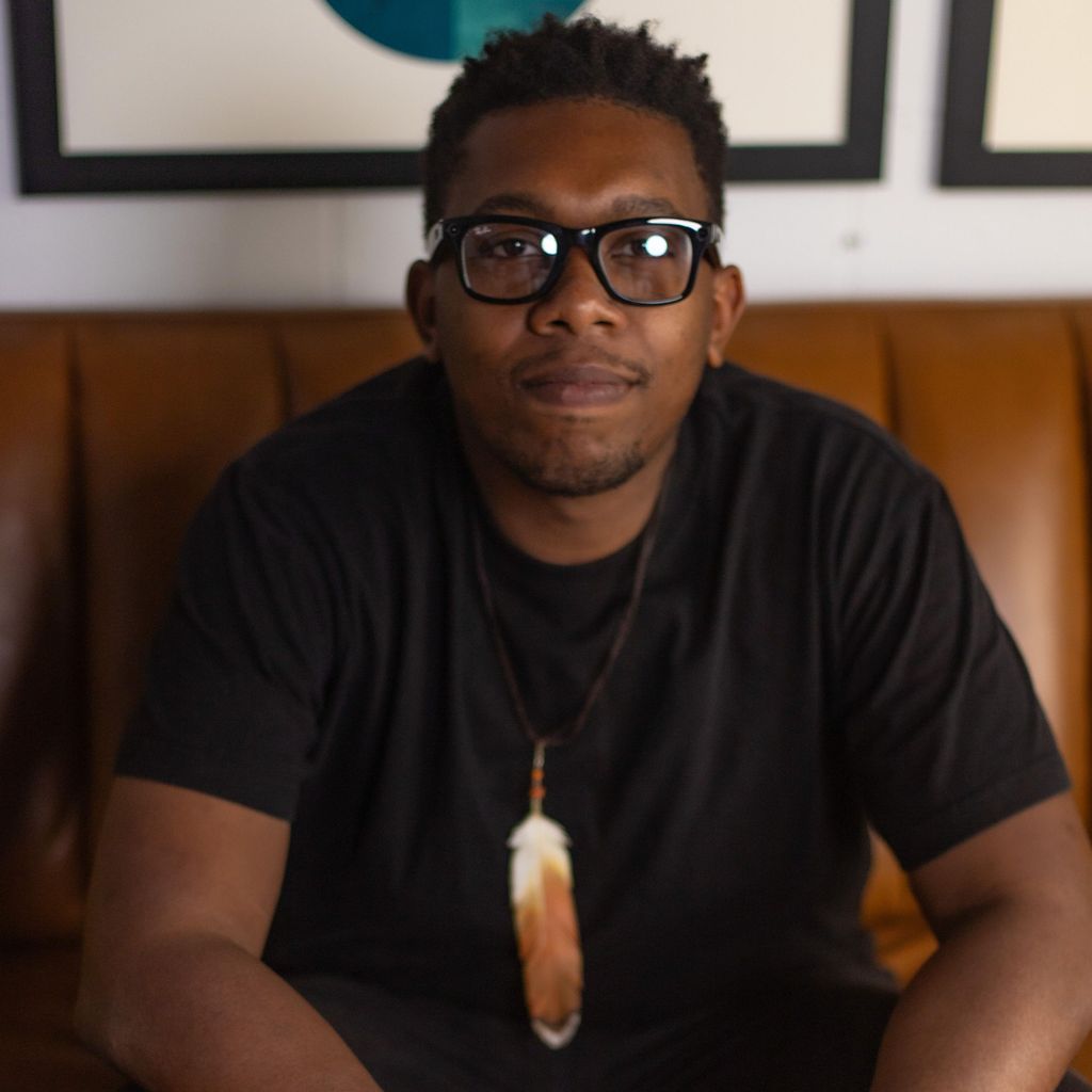 Hawk Feather Photo & Design