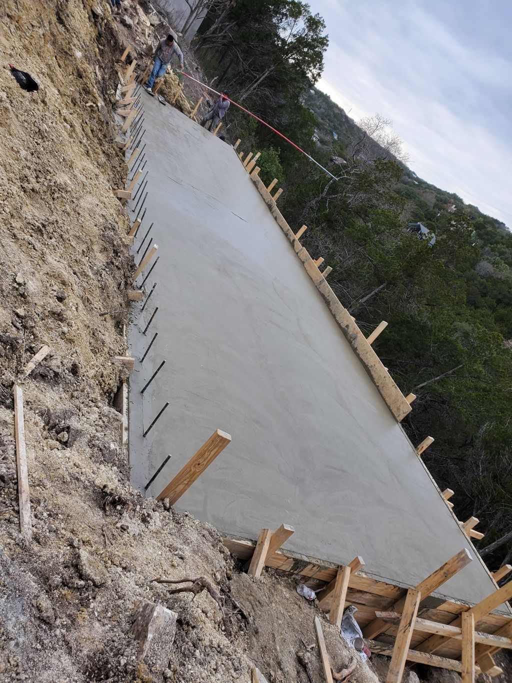 Foundation work on a crazy steep slope. We get it 