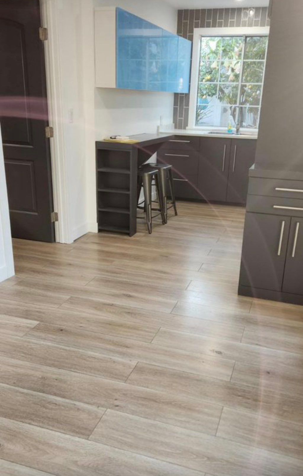 Installed new shiny white cabinets from ikea.