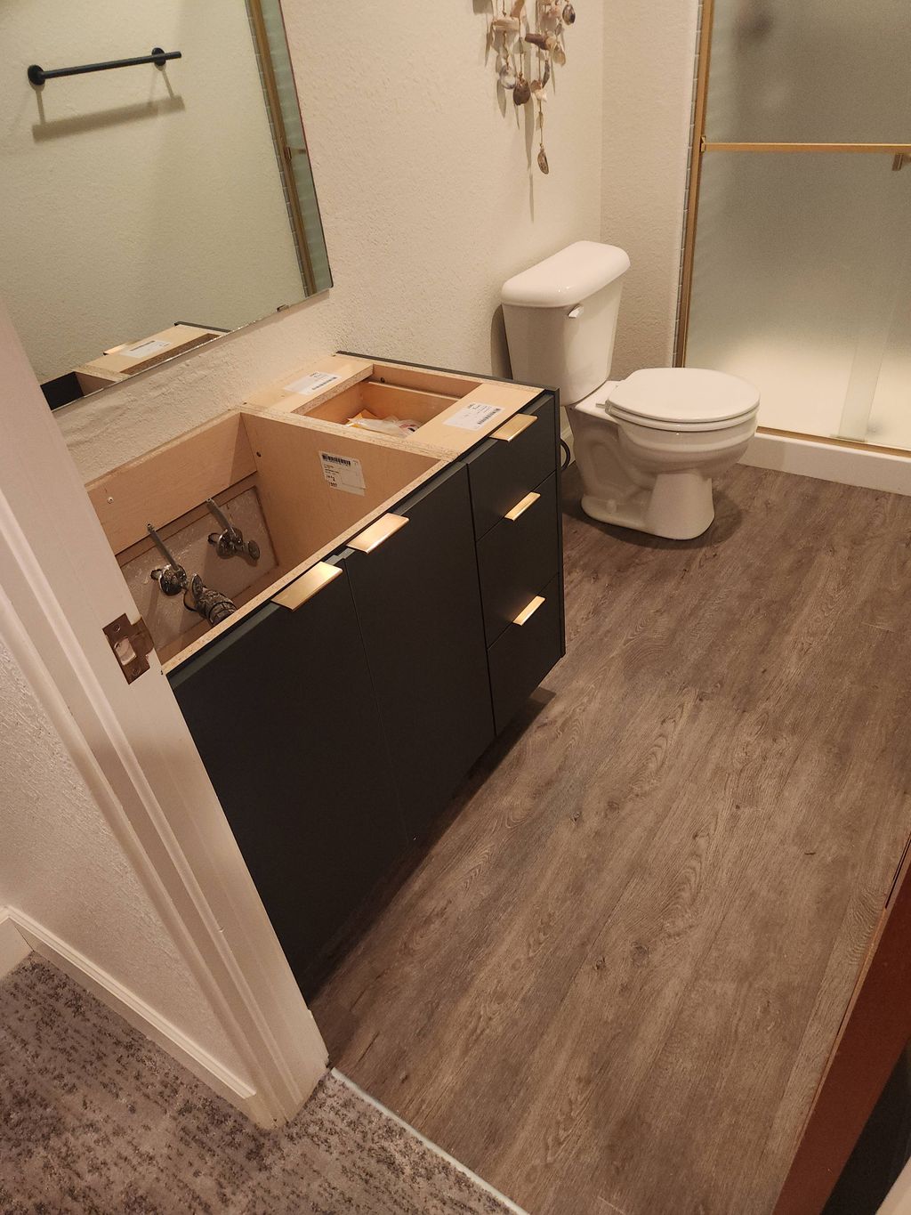 Bathroom Vanity install & Vinyl flooring 