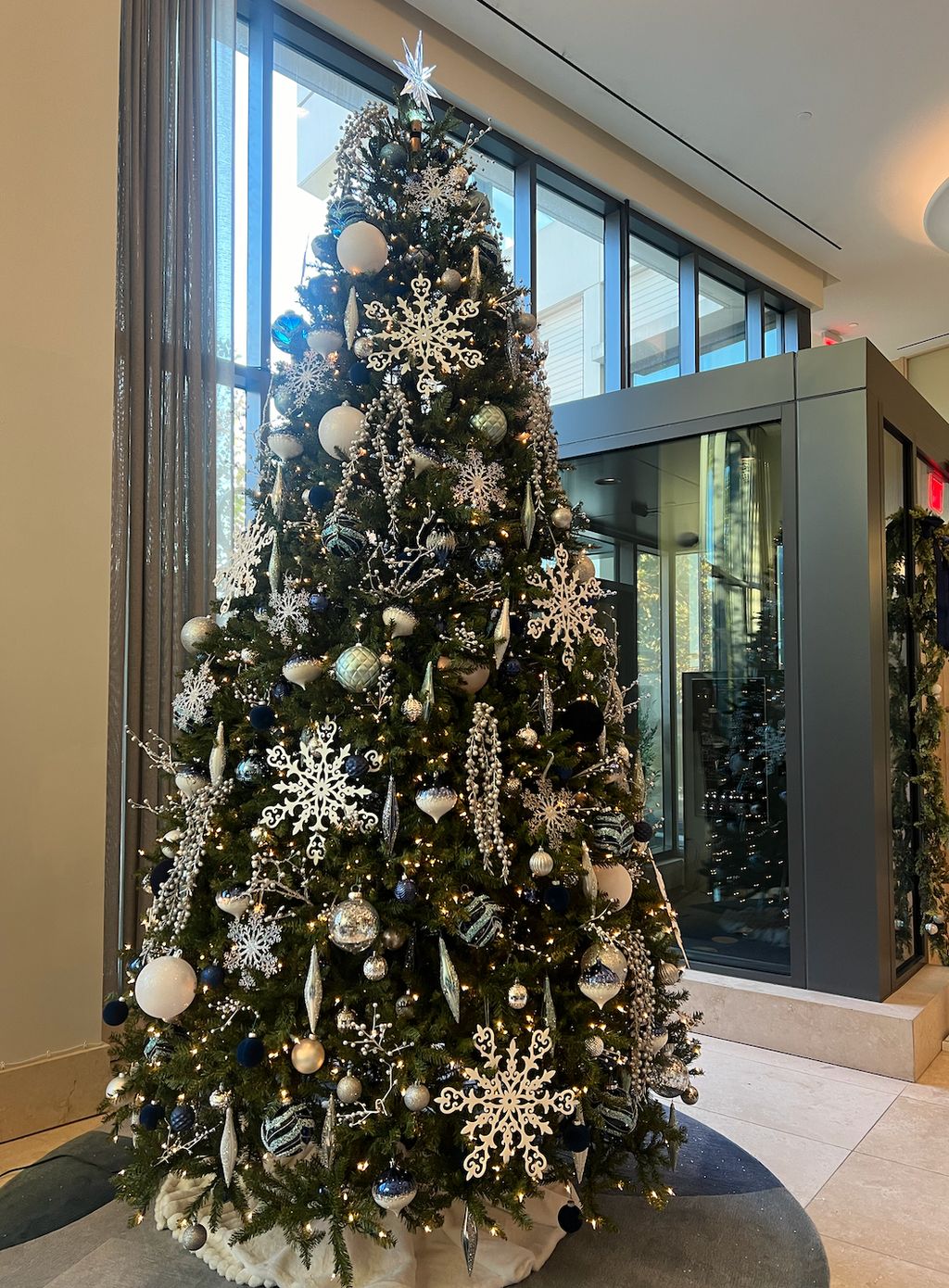 12ft. corporate Christmas tree with custom ornamen
