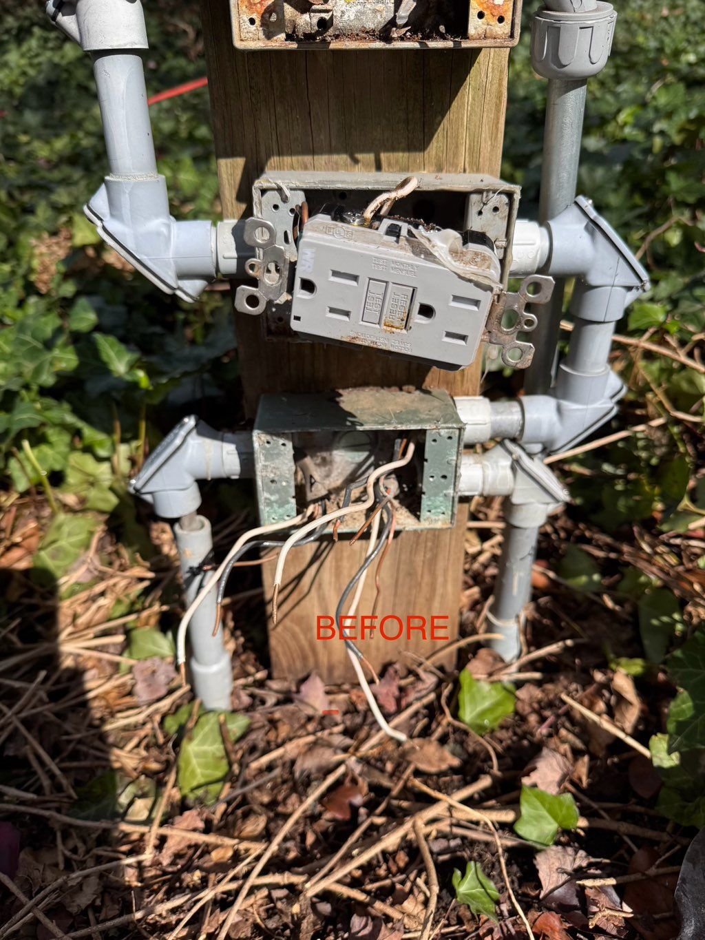 Rats nest of wires before cleaning up the mess.