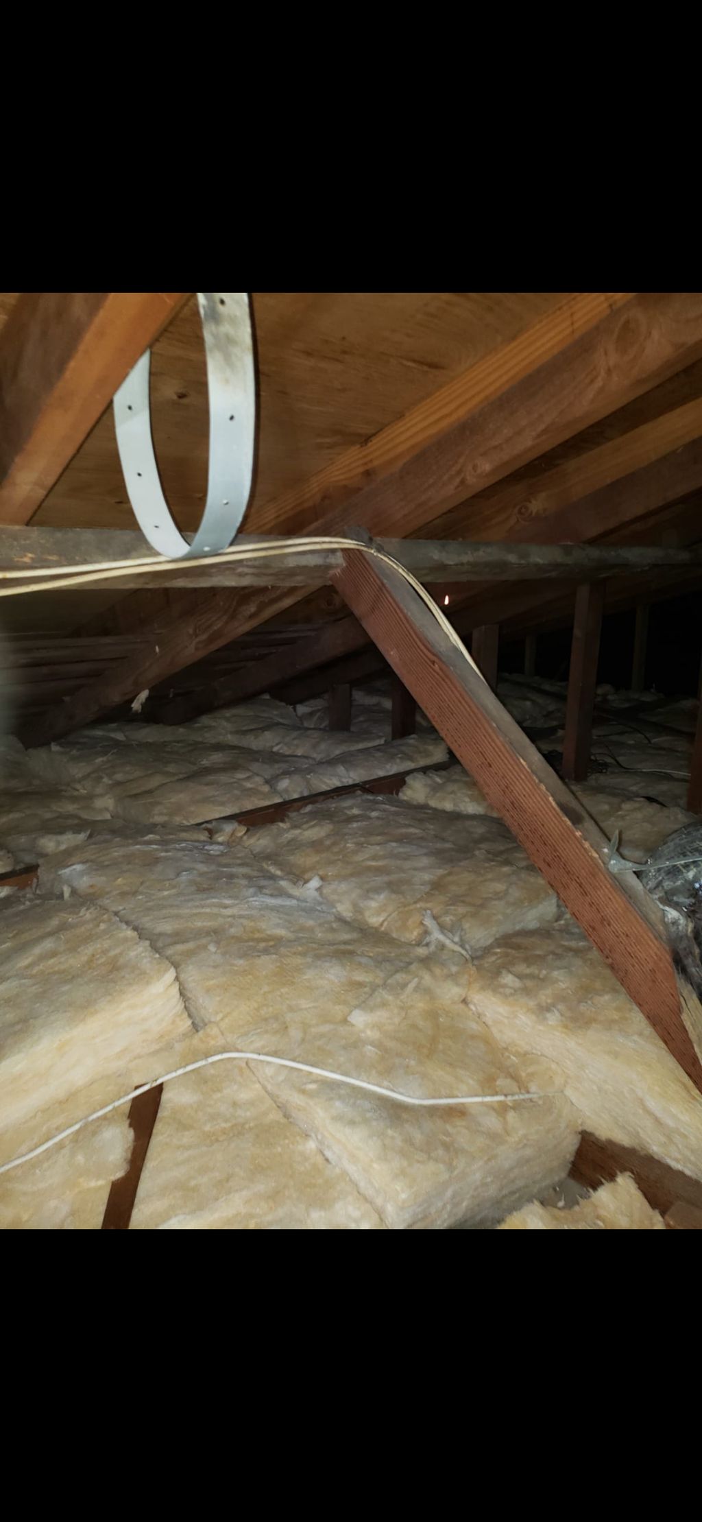 Brand new R-38 roll batt insulation installation. 